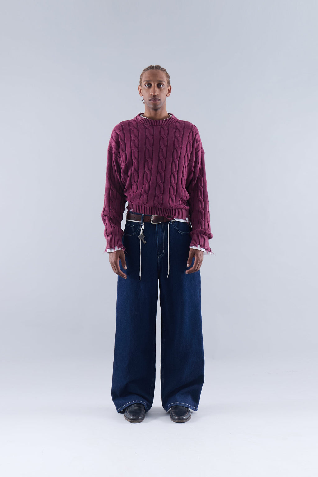 CABLE KNIT DISTRESSED SWEATER